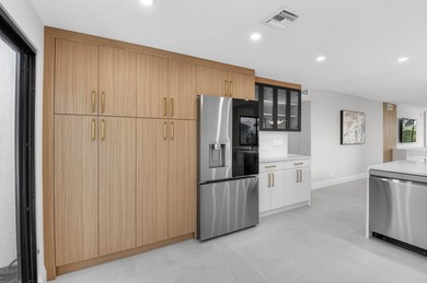 Meticulously upgraded, vibrant first floor 2 bedroom 2 bath on Gleneagles Golf and Country Club in Florida - for sale on GolfHomes.com, golf home, golf lot