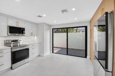 Meticulously upgraded, vibrant first floor 2 bedroom 2 bath on Gleneagles Golf and Country Club in Florida - for sale on GolfHomes.com, golf home, golf lot