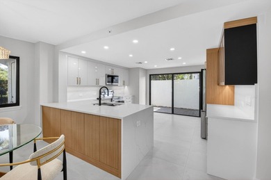 Meticulously upgraded, vibrant first floor 2 bedroom 2 bath on Gleneagles Golf and Country Club in Florida - for sale on GolfHomes.com, golf home, golf lot