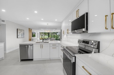 Meticulously upgraded, vibrant first floor 2 bedroom 2 bath on Gleneagles Golf and Country Club in Florida - for sale on GolfHomes.com, golf home, golf lot