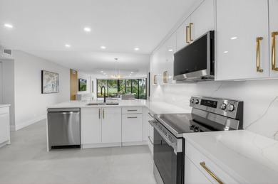 Meticulously upgraded, vibrant first floor 2 bedroom 2 bath on Gleneagles Golf and Country Club in Florida - for sale on GolfHomes.com, golf home, golf lot