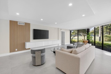 Meticulously upgraded, vibrant first floor 2 bedroom 2 bath on Gleneagles Golf and Country Club in Florida - for sale on GolfHomes.com, golf home, golf lot