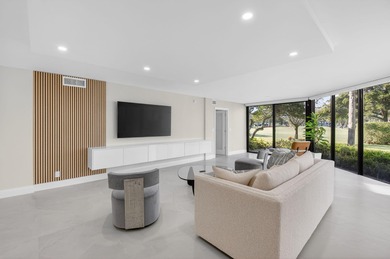 Meticulously upgraded, vibrant first floor 2 bedroom 2 bath on Gleneagles Golf and Country Club in Florida - for sale on GolfHomes.com, golf home, golf lot