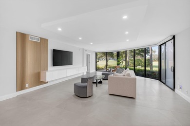 Meticulously upgraded, vibrant first floor 2 bedroom 2 bath on Gleneagles Golf and Country Club in Florida - for sale on GolfHomes.com, golf home, golf lot