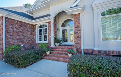 Welcome to 523 Candlewick Lane, a custombuilt ranch home on Ocean Ridge Plantation in North Carolina - for sale on GolfHomes.com, golf home, golf lot