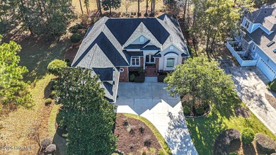 Welcome to 523 Candlewick Lane, a custombuilt ranch home on Ocean Ridge Plantation in North Carolina - for sale on GolfHomes.com, golf home, golf lot