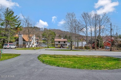 Experience the perfect blend of modern luxury and serene on The Hideout Golf in Pennsylvania - for sale on GolfHomes.com, golf home, golf lot