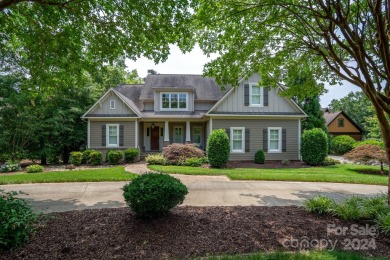 Welcome to your lakefront paradise! This beautiful lake home on Old North State Club at Uwharrie Point Golf community in North Carolina - for sale on GolfHomes.com, golf home, golf lot