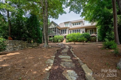 Welcome to your lakefront paradise! This beautiful lake home on Old North State Club at Uwharrie Point Golf community in North Carolina - for sale on GolfHomes.com, golf home, golf lot