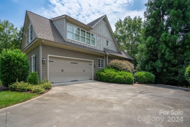 Welcome to your lakefront paradise! This beautiful lake home on Old North State Club at Uwharrie Point Golf community in North Carolina - for sale on GolfHomes.com, golf home, golf lot