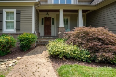 Welcome to your lakefront paradise! This beautiful lake home on Old North State Club at Uwharrie Point Golf community in North Carolina - for sale on GolfHomes.com, golf home, golf lot