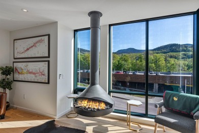 Welcome to your modern alpine retreat at Stowe's premier resort on Stowe Mountain Club in Vermont - for sale on GolfHomes.com, golf home, golf lot