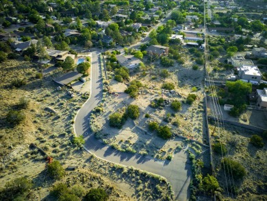 Discover the rare opportunity to own this .6-acre luxury home on The Canyon Club in New Mexico - for sale on GolfHomes.com, golf home, golf lot