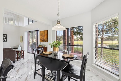 All brick two-story Eagle Harbor home with pond and fairway on Eagle Harbor Golf Club in Florida - for sale on GolfHomes.com, golf home, golf lot