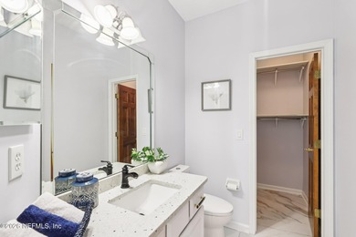 All brick two-story Eagle Harbor home with pond and fairway on Eagle Harbor Golf Club in Florida - for sale on GolfHomes.com, golf home, golf lot