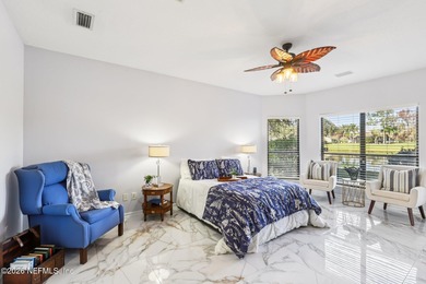 All brick two-story Eagle Harbor home with pond and fairway on Eagle Harbor Golf Club in Florida - for sale on GolfHomes.com, golf home, golf lot