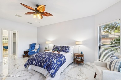 All brick two-story Eagle Harbor home with pond and fairway on Eagle Harbor Golf Club in Florida - for sale on GolfHomes.com, golf home, golf lot