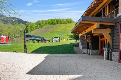 Welcome to your modern alpine retreat at Stowe's premier resort on Stowe Mountain Club in Vermont - for sale on GolfHomes.com, golf home, golf lot