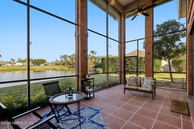 All brick two-story Eagle Harbor home with pond and fairway on Eagle Harbor Golf Club in Florida - for sale on GolfHomes.com, golf home, golf lot