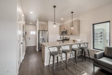 Home, sweet home! Modern style meets everyday comfort in this on Headwaters Golf Course At Granby Ranch in Colorado - for sale on GolfHomes.com, golf home, golf lot