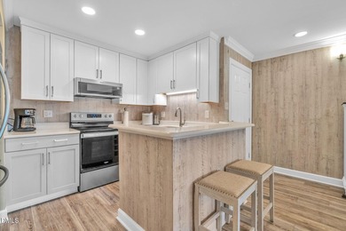 THE MOORINGS Unit 12 is a highly sought-after GROUND FLOOR unit on Kinderton Country Club in Virginia - for sale on GolfHomes.com, golf home, golf lot