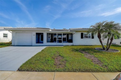 Welcome To This Charming 2 Bedroom 2 Bath Single-Family Home In on Mainlands Golf Club in Florida - for sale on GolfHomes.com, golf home, golf lot