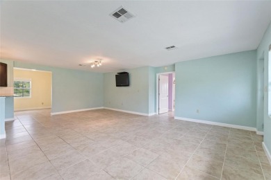 Exceptional Pool Home on 1 Acre in Indian Lake Estates - Golf on Indian Lake Estates Golf and Country Club in Florida - for sale on GolfHomes.com, golf home, golf lot