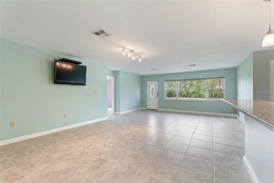 Exceptional Pool Home on 1 Acre in Indian Lake Estates - Golf on Indian Lake Estates Golf and Country Club in Florida - for sale on GolfHomes.com, golf home, golf lot