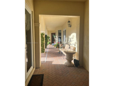 Beautifully appointed courtyard home located in an exclusive on Breakers Rees Jones Course in Florida - for sale on GolfHomes.com, golf home, golf lot