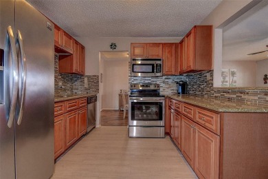Welcome To This Charming 2 Bedroom 2 Bath Single-Family Home In on Mainlands Golf Club in Florida - for sale on GolfHomes.com, golf home, golf lot