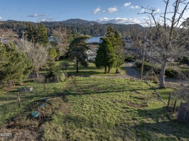 Charming Lake View Lot with New Septic Installed.  Located in on Chinook Winds Golf Resort in Oregon - for sale on GolfHomes.com, golf home, golf lot