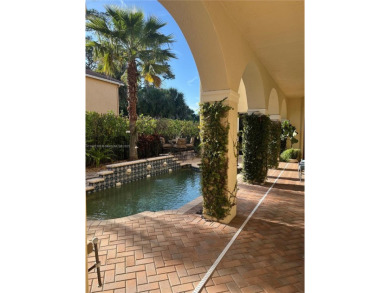 Beautifully appointed courtyard home located in an exclusive on Breakers Rees Jones Course in Florida - for sale on GolfHomes.com, golf home, golf lot