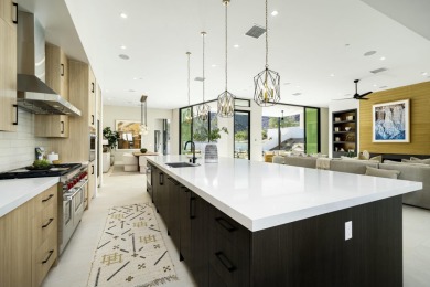 Discover modern elegance and desert beauty at 79242 Tom Fazio on The Quarry at La Quinta in California - for sale on GolfHomes.com, golf home, golf lot
