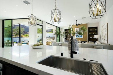 Discover modern elegance and desert beauty at 79242 Tom Fazio on The Quarry at La Quinta in California - for sale on GolfHomes.com, golf home, golf lot