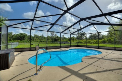 Exceptional Pool Home on 1 Acre in Indian Lake Estates - Golf on Indian Lake Estates Golf and Country Club in Florida - for sale on GolfHomes.com, golf home, golf lot