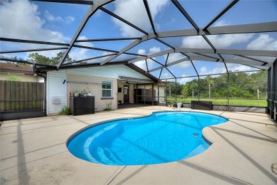 Exceptional Pool Home on 1 Acre in Indian Lake Estates - Golf on Indian Lake Estates Golf and Country Club in Florida - for sale on GolfHomes.com, golf home, golf lot