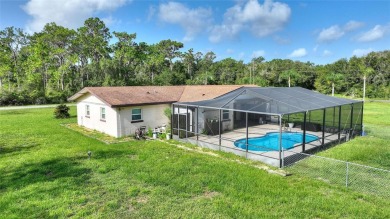 Exceptional Pool Home on 1 Acre in Indian Lake Estates - Golf on Indian Lake Estates Golf and Country Club in Florida - for sale on GolfHomes.com, golf home, golf lot
