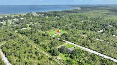 Exceptional Pool Home on 1 Acre in Indian Lake Estates - Golf on Indian Lake Estates Golf and Country Club in Florida - for sale on GolfHomes.com, golf home, golf lot