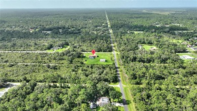 Exceptional Pool Home on 1 Acre in Indian Lake Estates - Golf on Indian Lake Estates Golf and Country Club in Florida - for sale on GolfHomes.com, golf home, golf lot