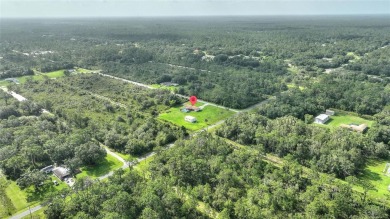 Exceptional Pool Home on 1 Acre in Indian Lake Estates - Golf on Indian Lake Estates Golf and Country Club in Florida - for sale on GolfHomes.com, golf home, golf lot