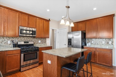 Welcome Home to Mill Creek - where sunrise golf course views on Mill Creek Golf Club in Illinois - for sale on GolfHomes.com, golf home, golf lot