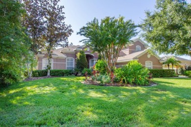 This executive 5 bedroom, 4 bathroom, 3 car garage, pool home on Wentworth Golf Club in Florida - for sale on GolfHomes.com, golf home, golf lot