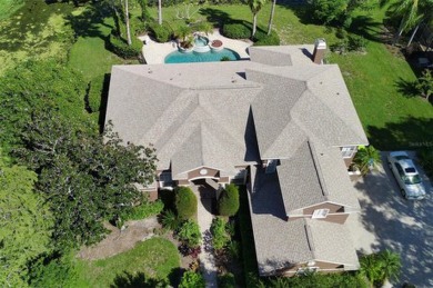 This executive 5 bedroom, 4 bathroom, 3 car garage, pool home on Wentworth Golf Club in Florida - for sale on GolfHomes.com, golf home, golf lot