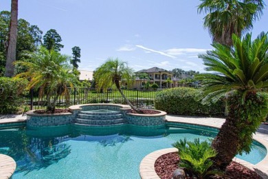 This executive 5 bedroom, 4 bathroom, 3 car garage, pool home on Wentworth Golf Club in Florida - for sale on GolfHomes.com, golf home, golf lot