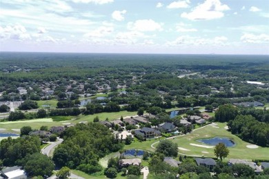 This executive 5 bedroom, 4 bathroom, 3 car garage, pool home on Wentworth Golf Club in Florida - for sale on GolfHomes.com, golf home, golf lot