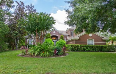 This executive 5 bedroom, 4 bathroom, 3 car garage, pool home on Wentworth Golf Club in Florida - for sale on GolfHomes.com, golf home, golf lot