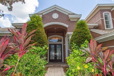 This executive 5 bedroom, 4 bathroom, 3 car garage, pool home on Wentworth Golf Club in Florida - for sale on GolfHomes.com, golf home, golf lot