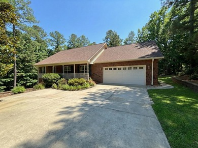 Experience timeless privacy and comfort at 207 Wolf Den Place on Monticello Golf Club At Savannah Lakes in South Carolina - for sale on GolfHomes.com, golf home, golf lot