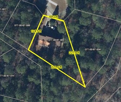 Experience timeless privacy and comfort at 207 Wolf Den Place on Monticello Golf Club At Savannah Lakes in South Carolina - for sale on GolfHomes.com, golf home, golf lot