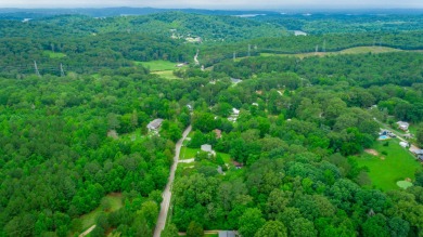 With over a half acre of beautiful forest, this lot offers the on  in Tennessee - for sale on GolfHomes.com, golf home, golf lot